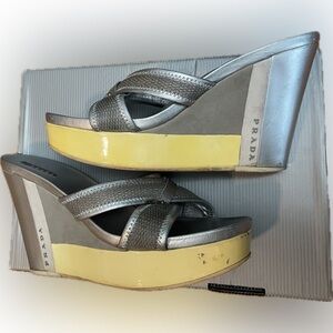 Size 40.5 silver Prada wedge sandals.